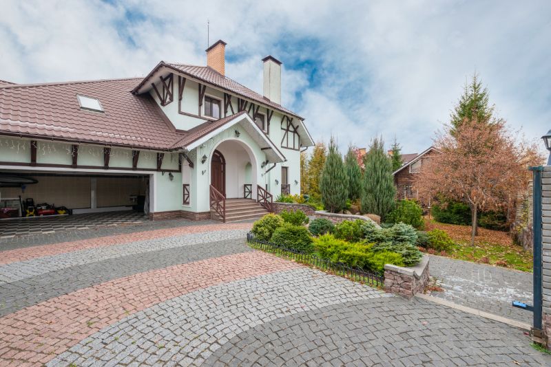 Front yard concrete driveway with a smooth finish