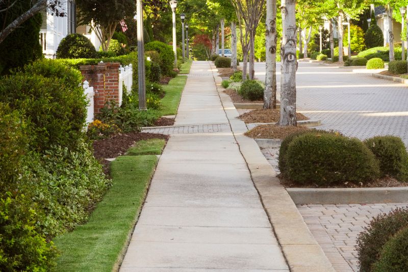 Concrete footpath running through a residential Loganholme neighbourhood