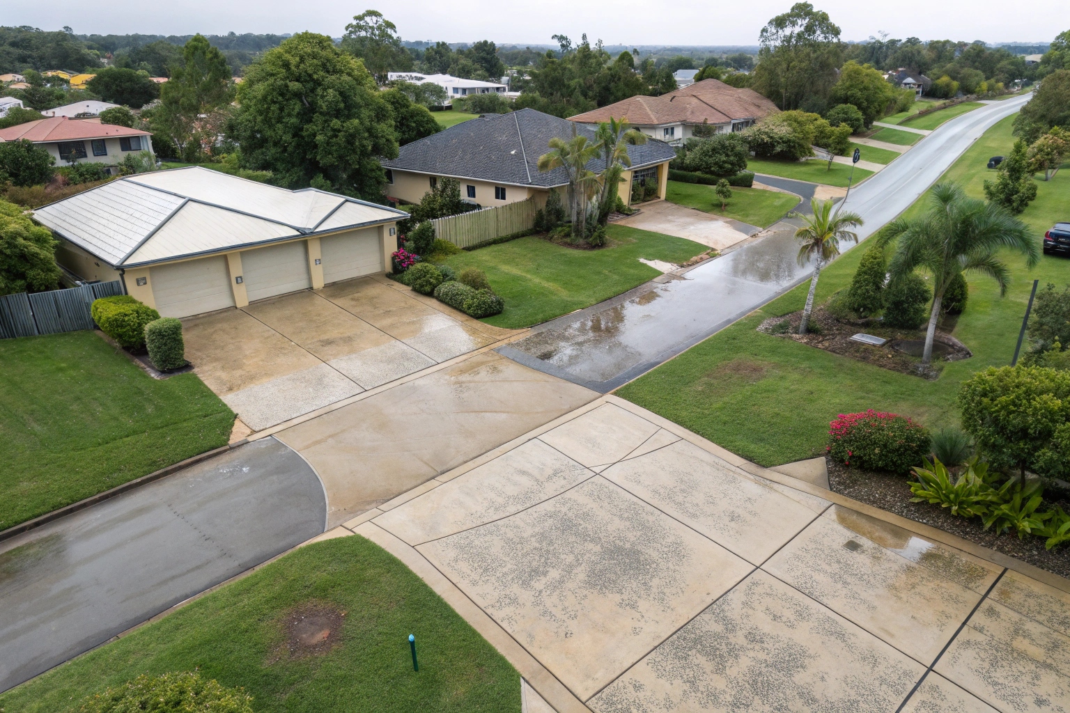 Aerial view of residential concrete driveways across Logan suburbs