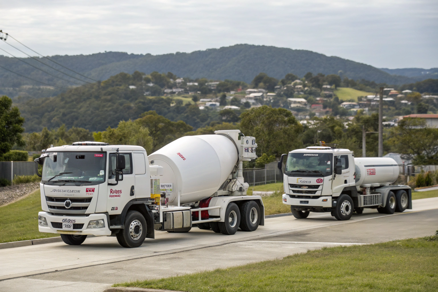 Fleet of concrete delivery trucks on a Logan street