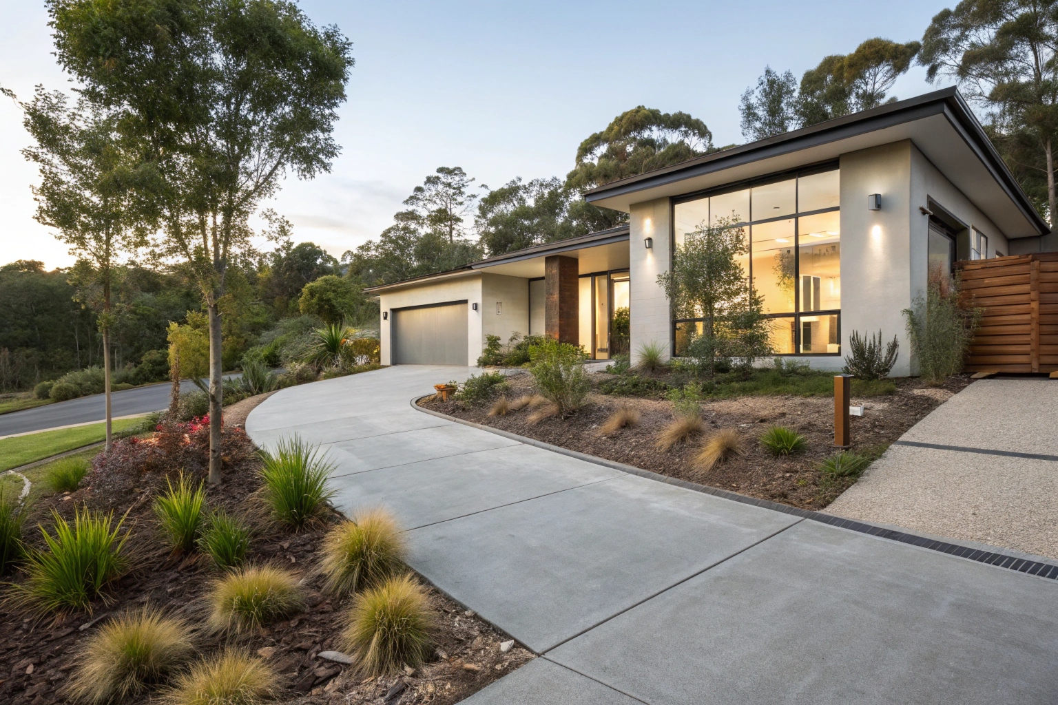Modern Australian home with a freshly finished decorative concrete driveway